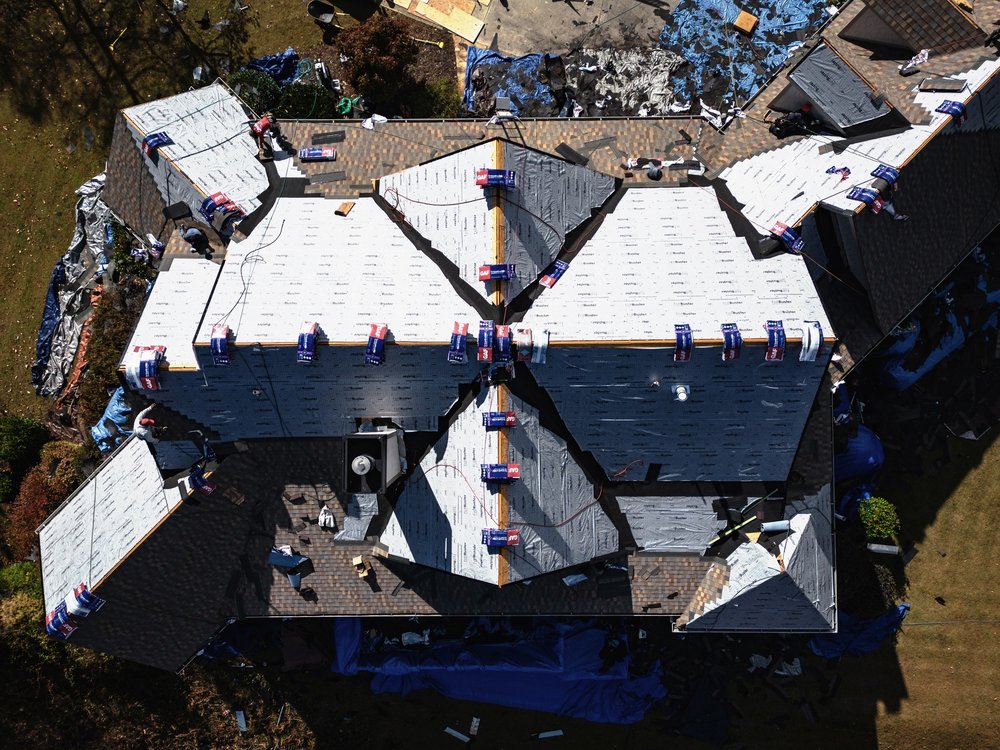 Slide of SharpTop Roofing