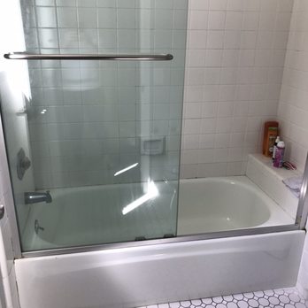 Over The Top Refinishing - Old set-up with sliding glass doors that needed to go - General Contractors Near Me - Costa Mesa, California Over The Top Refinishing - Old set-up with sliding glass doors that needed to go - General Contractors Near Me - Costa Mesa, California