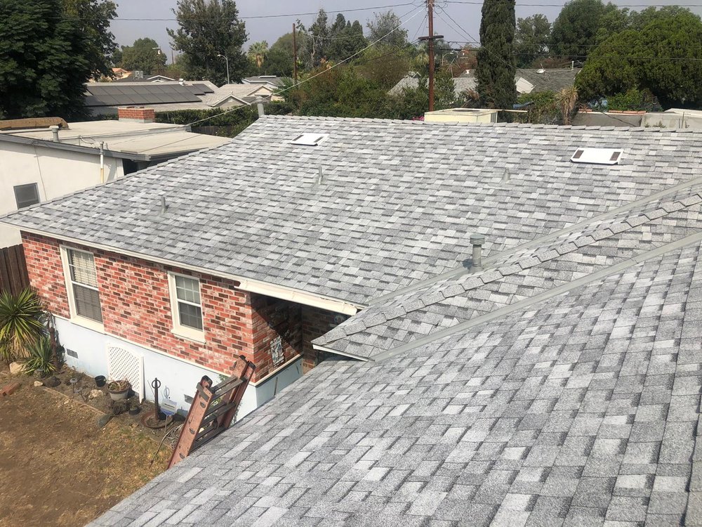 Slide of All American Construction and Roofing