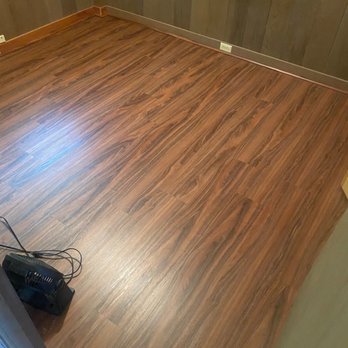 Amcor Construction - New vinyl flooring with base boards - General Contractors Near Me