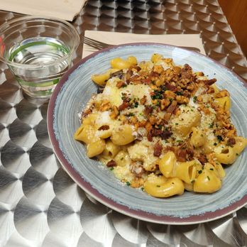 Pasta Casalinga - Pipe with pancetta, seasonal mushrooms, ricotta, walnuts and saffron. Filling, solid fare. - Italian Near Me - Seattle, Washington