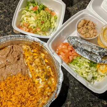 Los Chilakillers - Tex Mex Austin Style - One Beef Enchilada w Gravy Sauce, Crispy Chicken Taco served with Rice, Beans, Guacamole & Chile con Queso. - Mexican Near Me - Austin, Texas