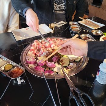 Ombu Grill - More cooking of the meats and vegetables - Korean Near Me - Midvale, Utah Ombu Grill - More cooking of the meats and vegetables - Korean Near Me - Midvale, Utah