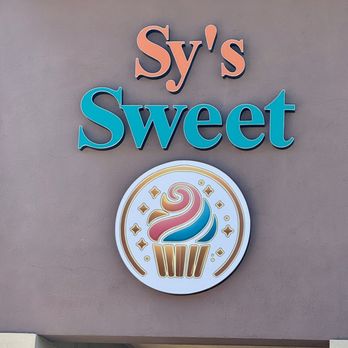 Sy's Sweet Dessert Bar - Outdoor signage of Sy's Sweet! The establishment is named after the owner's daughter- so sweet!! - Bakeries Near Me - Las Vegas, Nevada Sy's Sweet Dessert Bar - Outdoor signage of Sy's Sweet! The establishment is named after the owner's daughter- so sweet!! - Bakeries Near Me - Las Vegas, Nevada