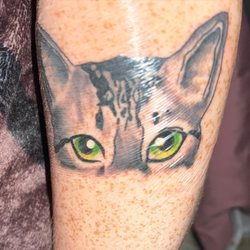 Top Secret Tattoos and Piercings