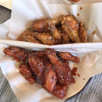 The Chicken On Fire - wings; bottom: "regular" spicy top: evil smoky curry - Chicken Wings Near Me - Castro Valley, California The Chicken On Fire - wings; bottom: "regular" spicy top: evil smoky curry - Chicken Wings Near Me - Castro Valley, California