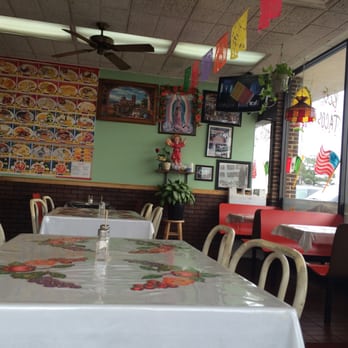 Taqueria EL Toreo - TV and pictured menu items on the wall - Mexican Near Me - Bensenville, Illinois Taqueria EL Toreo - TV and pictured menu items on the wall - Mexican Near Me - Bensenville, Illinois