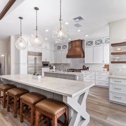 TraVek Remodeling & Roofing - Double islands in the kitchen, where one serves as a working counter and the other as an eating counter.