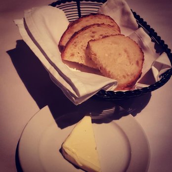 Campagnola - Crusty homemade warm bread served with butter - Italian Near Me - Evanston, Illinois Campagnola - Crusty homemade warm bread served with butter - Italian Near Me - Evanston, Illinois