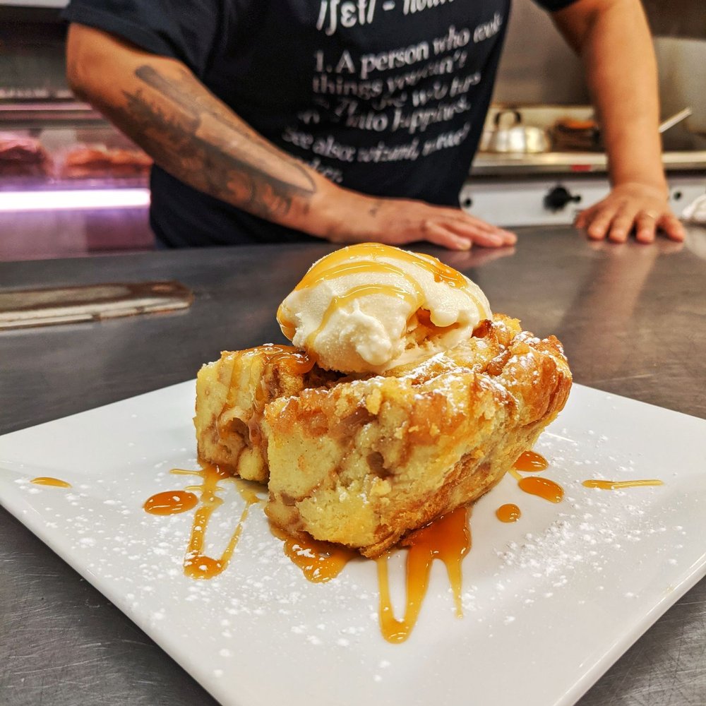 Papa L.E.W. - a man in a chef's kitchen - Burgers Near Me - Brevard, North Carolina