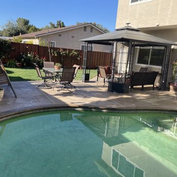 Rock Solid - Backyard lawn and pool protected during the process - Masonry/Concrete Near Me - Dublin, California