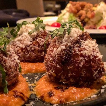Truffles - Off the menu. I have no idea what exactly is in it but it's delicious. Goat cheese, prosciutto, rice, etc - American Near Me - St. Louis, Missouri