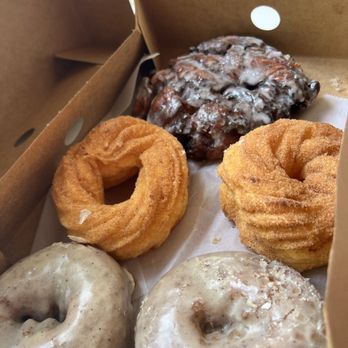 The Goods - Brown Butter & Sea Salt (Bottom), Cinnamon Sugar Crueler (Middle), Apple Fritter (Top) - Donuts Near Me - Carlsbad, California