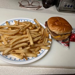 a hamburger and french fries on a plate a hamburger and french fries on a plate