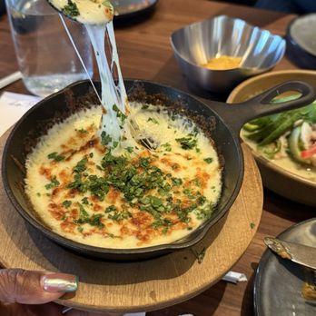 La Popular - Starter-Queso Fundido. look at that cheese pull - Mexican Near Me - Redlands, California La Popular - Starter-Queso Fundido. look at that cheese pull - Mexican Near Me - Redlands, California