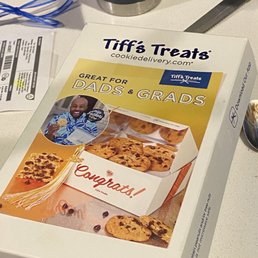 a box of cookies and a pair of scissors