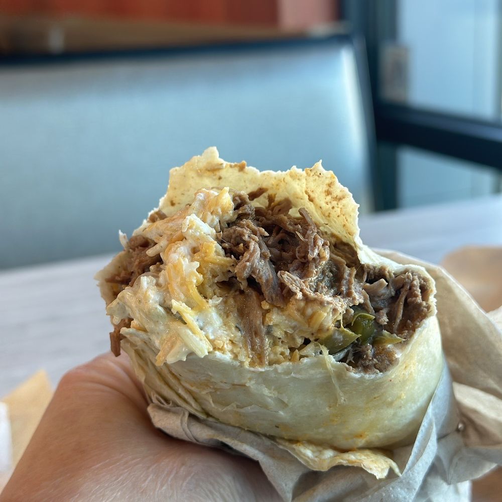 Moe's Southwest Grill - Good looking, tasty birria burrito with queso, shredded cheese, and a lil onions/peppers. - Tex-Mex Near Me - Durham, North Carolina Moe's Southwest Grill - Good looking, tasty birria burrito with queso, shredded cheese, and a lil onions/peppers. - Tex-Mex Near Me - Durham, North Carolina
