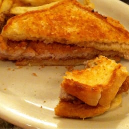 Fried pork tenderloin sandwich. Fried pork tenderloin sandwich.