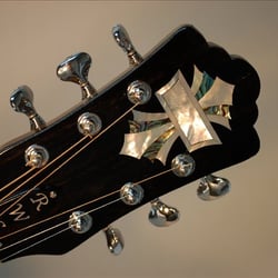 Smooth Stone Guitars - Custom inlaid peghead.