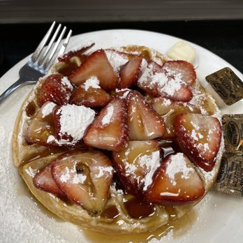 Theo's Cozy Corner - My breakfast today -- a simple but very well-prepared waffle with strawberries and syrup. - Breakfast & Brunch Near Me - Boston, Massachusetts