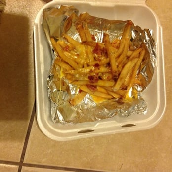 Outback Steakhouse - 1/2 order of cheese fries, if you can even call it that... - Steakhouses Near Me - Winter Park, Florida Outback Steakhouse - 1/2 order of cheese fries, if you can even call it that... - Steakhouses Near Me - Winter Park, Florida