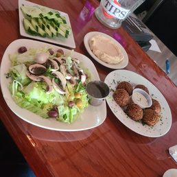 Falafel, Hummus, Sliced Cucumbers and Cobb Salad. Falafel, Hummus, Sliced Cucumbers and Cobb Salad.
