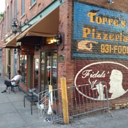 Tobacconist locate in turn-of-the-century brick building