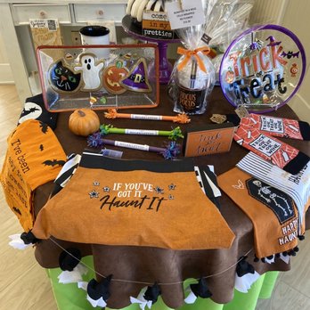 Nothing Bundt Cakes - a table with halloween decorations - Bakeries Near Me - La Quinta, California