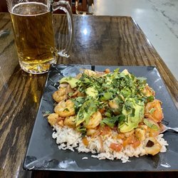 Blue Cactus Tacos & Tequila Bar - Seafood Al Ajillo and a tall Modelo Especial