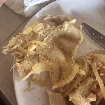 Los Pinos - Grilled chicken. You can see the fat coating on top of it. Not cleaned well and super rubbery - Puerto Rican Near Me - Carolina, Puerto Rico
