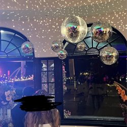 Disco balls installed for our reception at Spanish Hills Club.