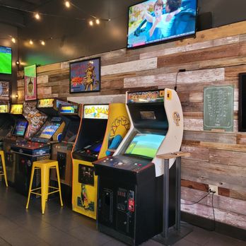 The Lot Beer - a row of arcade machines - Arcades Near Me - Granville, Ohio The Lot Beer - a row of arcade machines - Arcades Near Me - Granville, Ohio