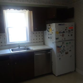 Maryland Renovations and more - kitchen before pic 2- fridge and sink - General Contractors Near Me - Laurel, Maryland Maryland Renovations and more - kitchen before pic 2- fridge and sink - General Contractors Near Me - Laurel, Maryland