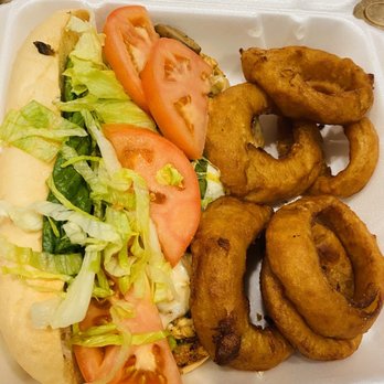 River Pub - River Chicken and Cheese Sandwich with onion rings - American Near Me - Raleigh, North Carolina River Pub - River Chicken and Cheese Sandwich with onion rings - American Near Me - Raleigh, North Carolina