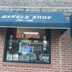 Caputo's Barber Shop - Store window