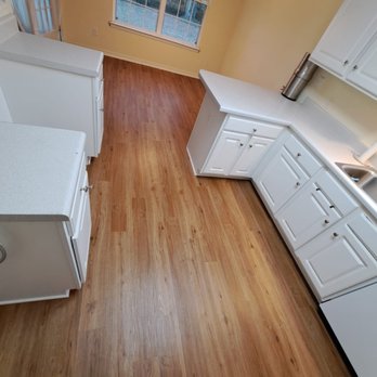PFT Flooring Tejeda - a person standing in a kitchen - Flooring Near Me PFT Flooring Tejeda - a person standing in a kitchen - Flooring Near Me