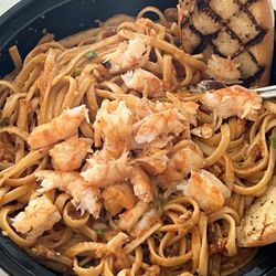 Mombo's Pizza - After we had to peel the shrimp, I figured I would break it in pieces