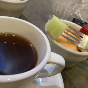 Blue Dolphin - a cup of tea and a plate of fruit - Greek Near Me - Kalamazoo, Michigan