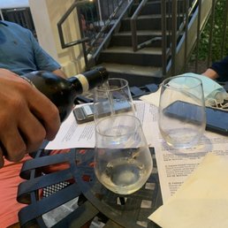Italian Wines on the porch. We bought a couple glasses of this one to help with the gaps.