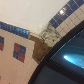 PSY Spa USA - Broken tile on the walls in multiple places - Skin Care Near Me - San Leandro, California PSY Spa USA - Broken tile on the walls in multiple places - Skin Care Near Me - San Leandro, California