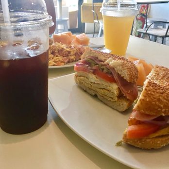 Coffee Cup - Mexican bagel sandwhich with jalapeños, and an iced coffee. - Breakfast & Brunch Near Me - Puerto Vallarta, JAL Coffee Cup - Mexican bagel sandwhich with jalapeños, and an iced coffee. - Breakfast & Brunch Near Me - Puerto Vallarta, JAL