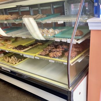 Tas T O Donuts - a display of donuts - Donuts Near Me - Arlington, Tennessee Tas T O Donuts - a display of donuts - Donuts Near Me - Arlington, Tennessee