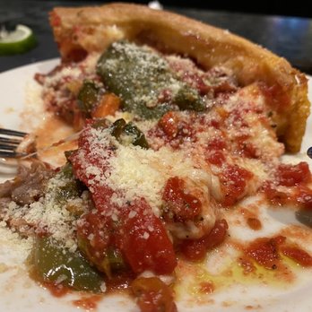 Gino's East - South Loop - Ask for parmesan... slice of Chicago Fire was pretty good! (4/3/21) - Pizza Near Me - Chicago, Illinois