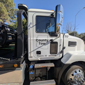 County Tow Service - Passenger door with logo - Roadside Assistance Near Me County Tow Service - Passenger door with logo - Roadside Assistance Near Me