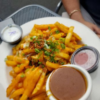 Ireland's Four Courts - Four court fries with curry sauce - Breakfast & Brunch Near Me - Arlington, Virginia Ireland's Four Courts - Four court fries with curry sauce - Breakfast & Brunch Near Me - Arlington, Virginia