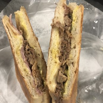 Ant - The "Our Famous Cuban Sandwich" can stand on its own! (See what I did there?). It's the best Cuban in Pasco for sure! - Italian Near Me - New Port Richey, Florida