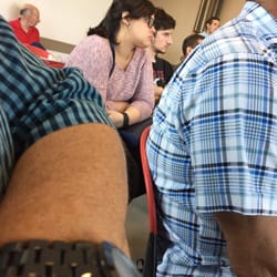 Antonio Rivera Rodríguez Airport - Bored People In Crowded Waiting Room. My Arm. Den's Shoulder