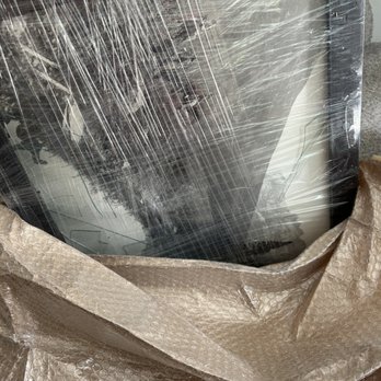 Bentley Moving and Storage - Smashed photo frame, one of many - Self Storage Near Me