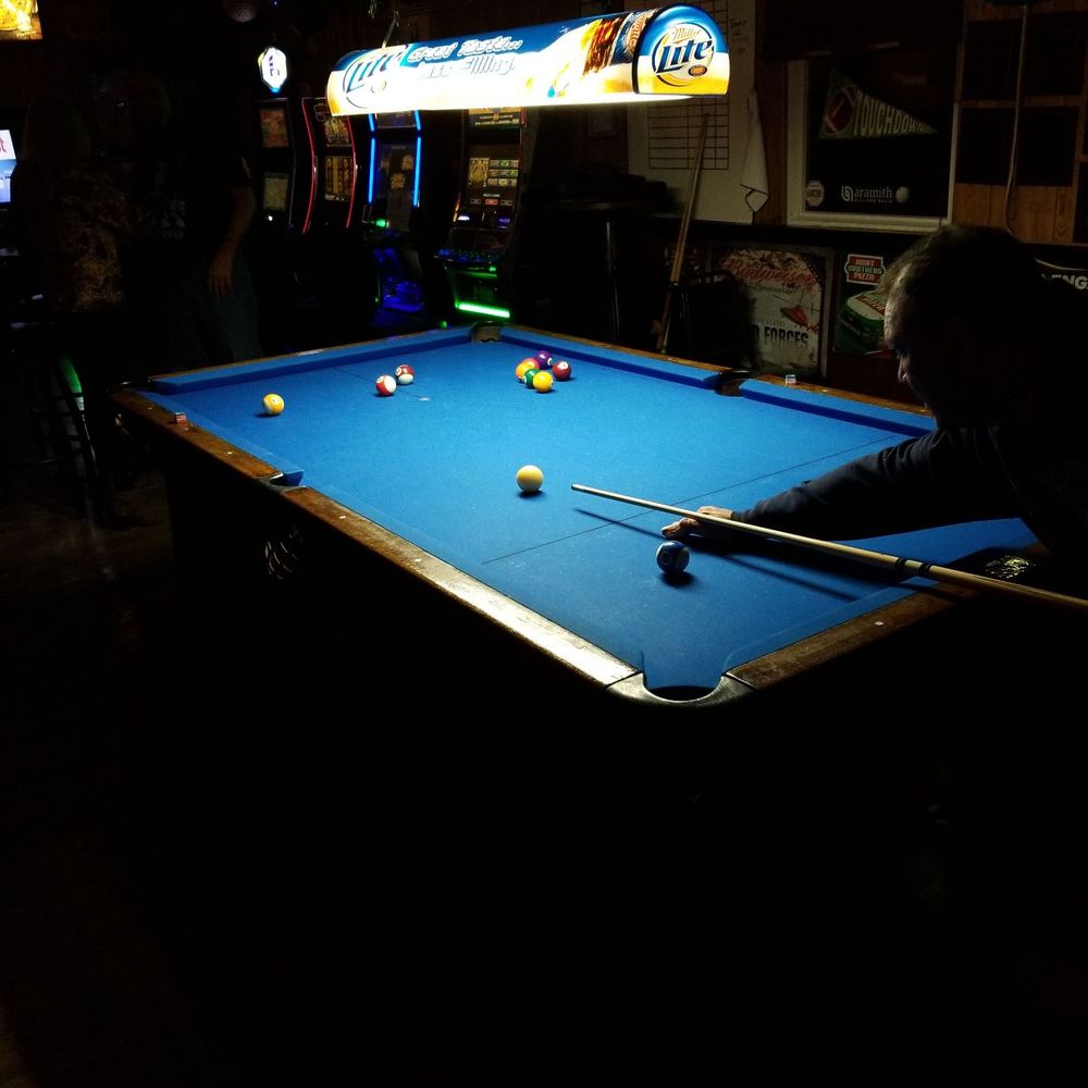 Night Moves - a pool table in a dark room - Bars Near Me - Belleville, Illinois Night Moves - a pool table in a dark room - Bars Near Me - Belleville, Illinois
