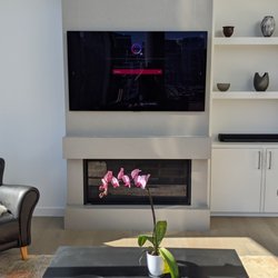 ThoseTechGuys - OLED TV mounted on concrete slab in Seattle high-rise condo